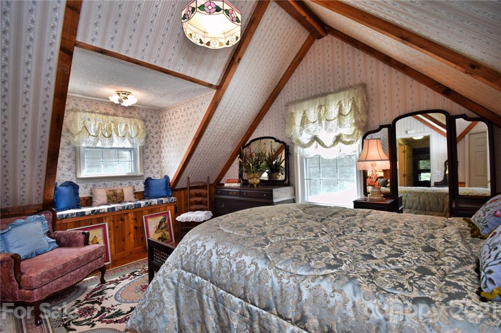 5424 Castle Ford Road Boone, NC 28607 - Photo 48 of 48 a bedroom with furniture and a large window