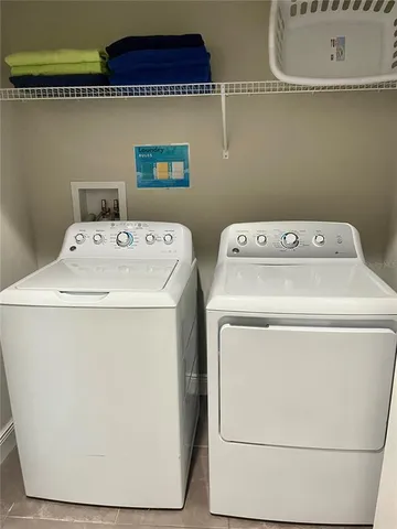 a utility room with dryer and washer