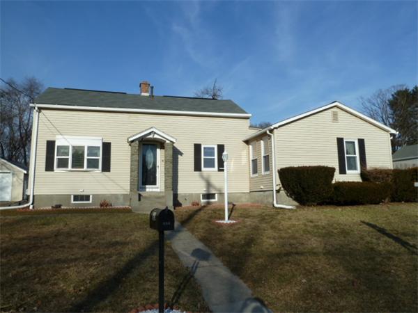123 Lawrence Road Chicopee, MA 01013 - Photo 1 of 23 a front view of a house with garden