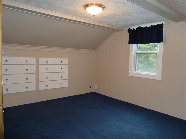 123 Lawrence Road Chicopee, MA 01013 - Photo 16 of 23 a view of an empty room with a window