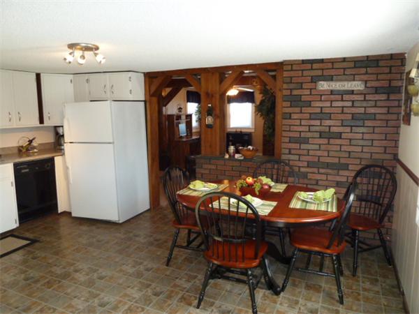 123 Lawrence Road Chicopee, MA 01013 - Photo 3 of 23 a view of a dining room with furniture