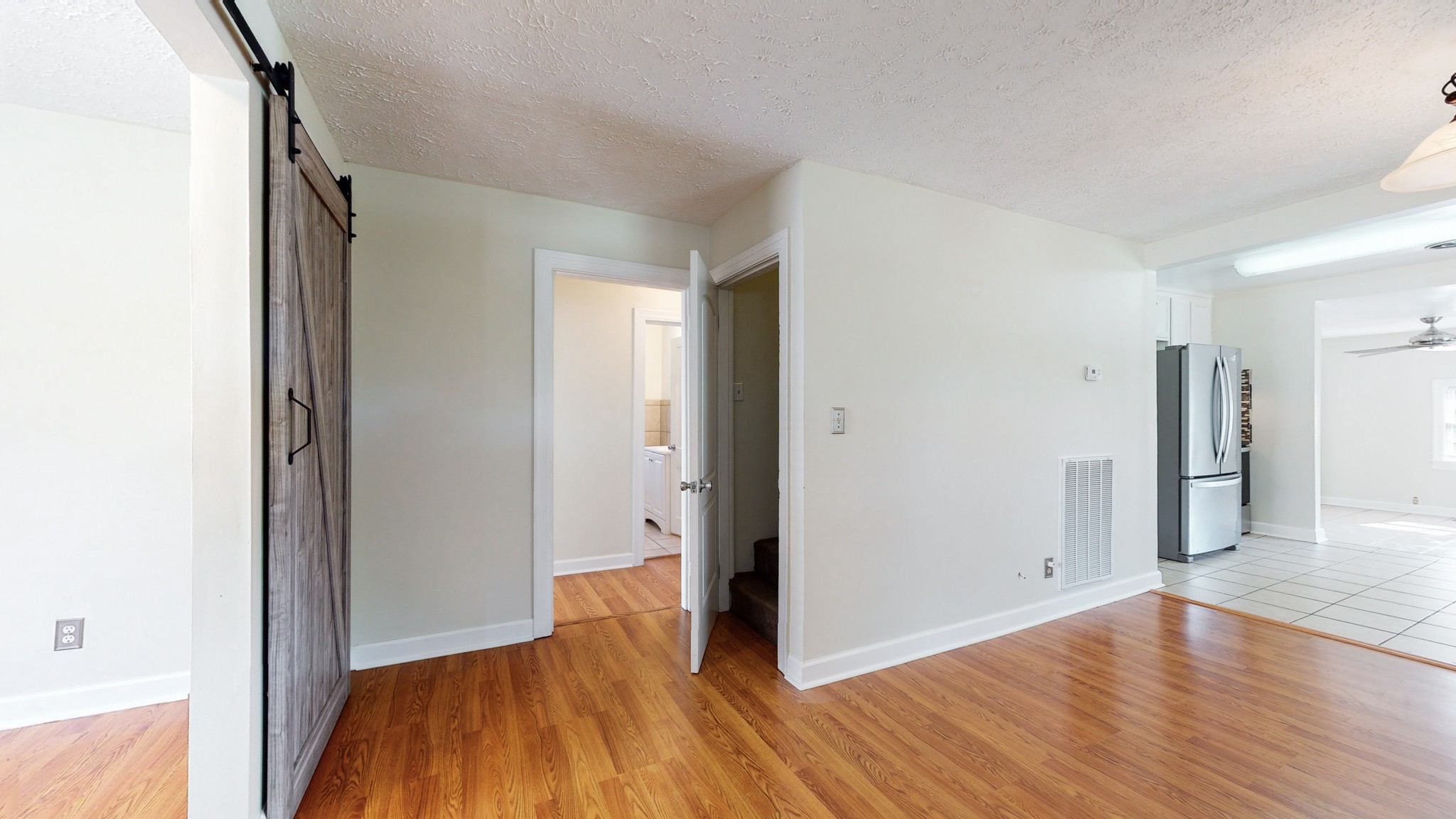 343 Neelys Bend Road Madison, TN 37115 - Photo 3 of 28 a view of a hallway with wooden floor