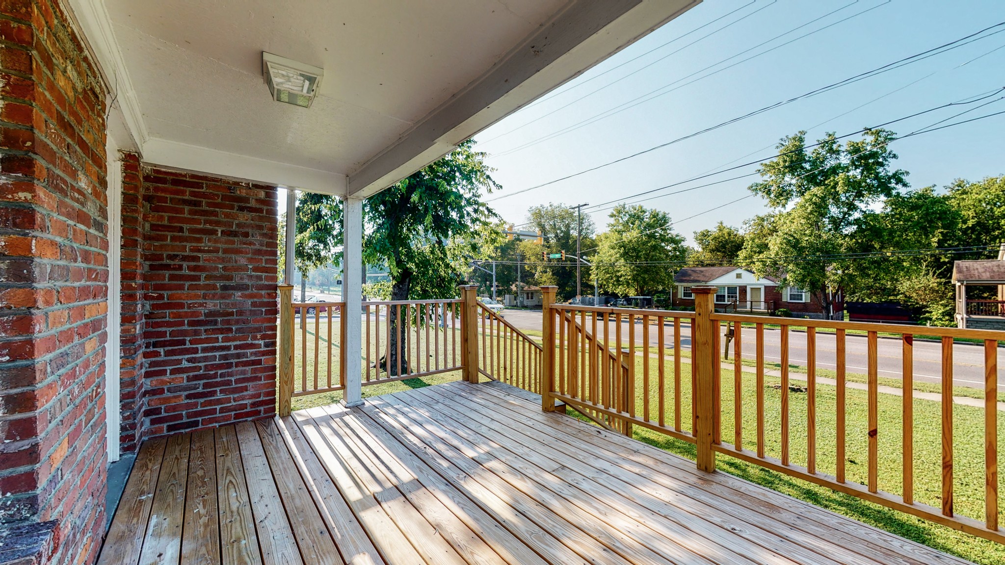 343 Neelys Bend Road Madison, TN 37115 - Photo 21 of 28 a view of balcony with wooden floor and fence