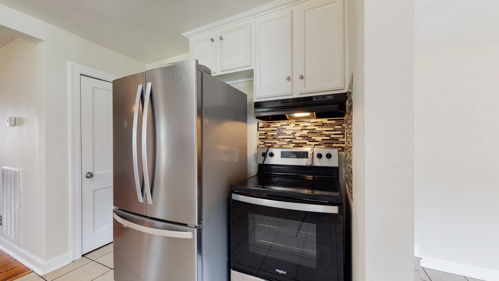 343 Neelys Bend Road Madison, TN 37115 - Photo 9 of 28 a kitchen with appliances and cabinets