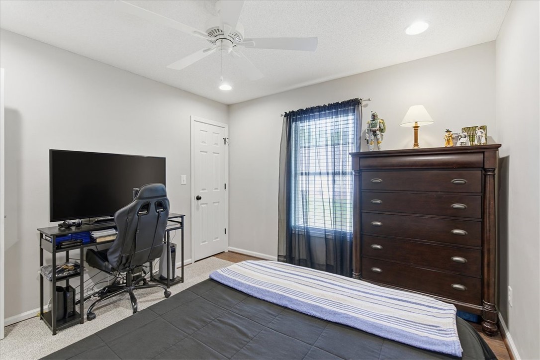 166 Amberwood Drive Anderson, SC 29621 - Photo 12 of 38 This cozy bedroom offers comfort and a well-lit space perfect for relaxation.