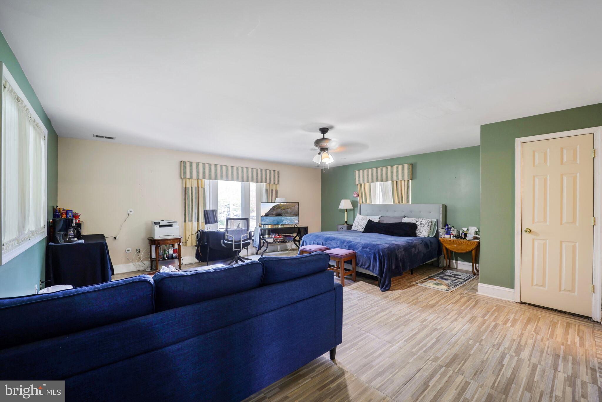 1410 Missouri Avenue Northwest Washington, DC 20011 - Photo 21 of 38 a living room with furniture and wooden floor