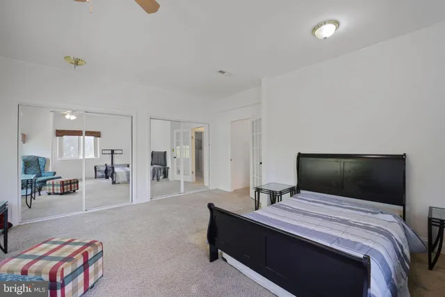 a kitchen with a stove and a refrigerator