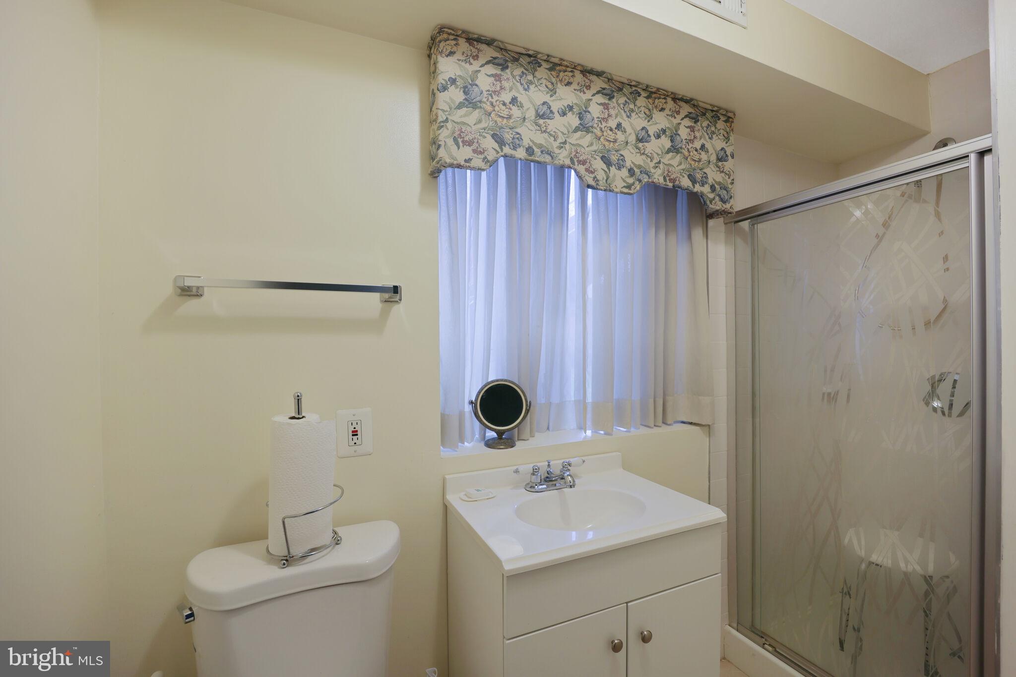 1410 Missouri Avenue Northwest Washington, DC 20011 - Photo 30 of 38 a bathroom with a sink a toilet and shower