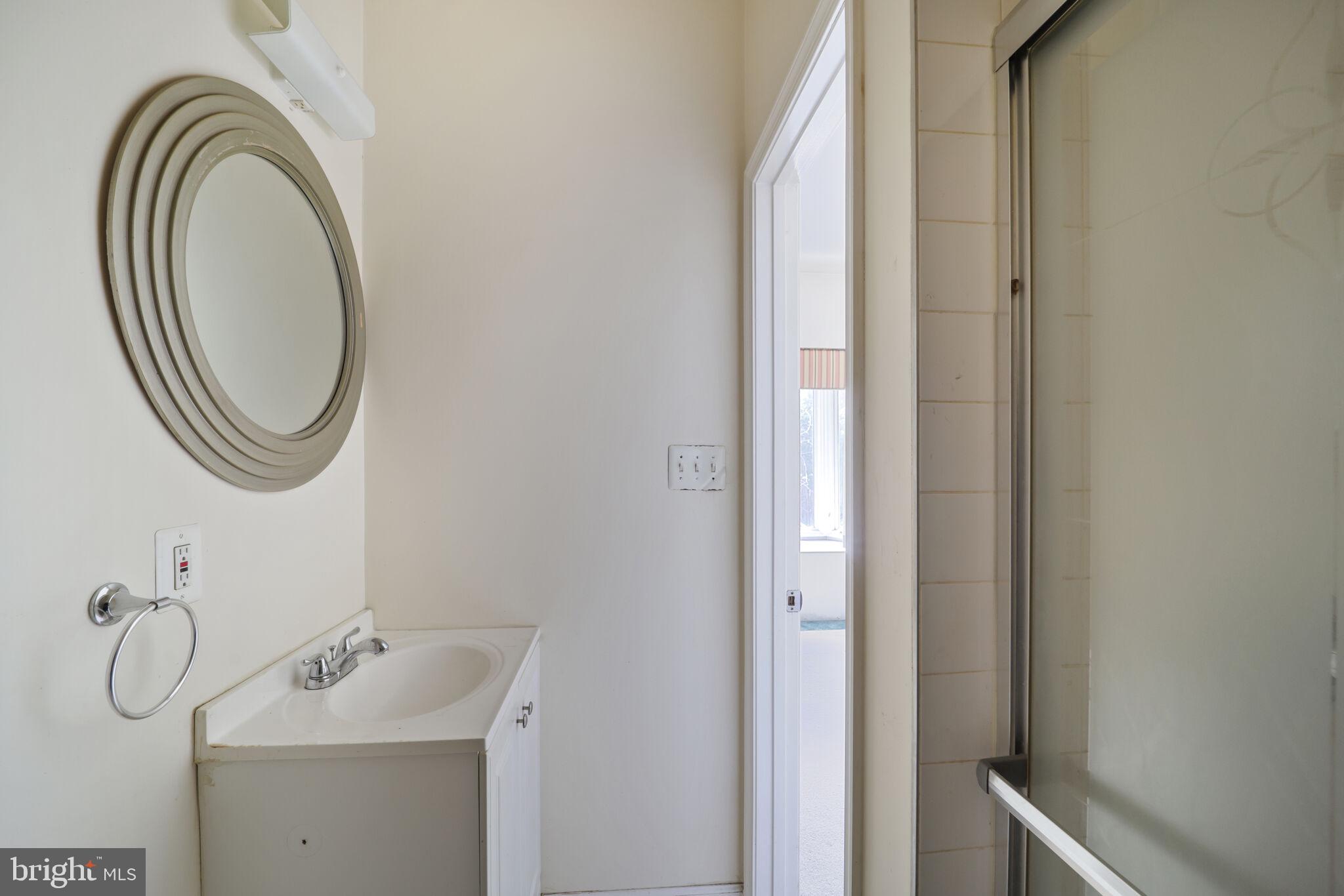 1410 Missouri Avenue Northwest Washington, DC 20011 - Photo 33 of 38 a bathroom with a sink and a mirror