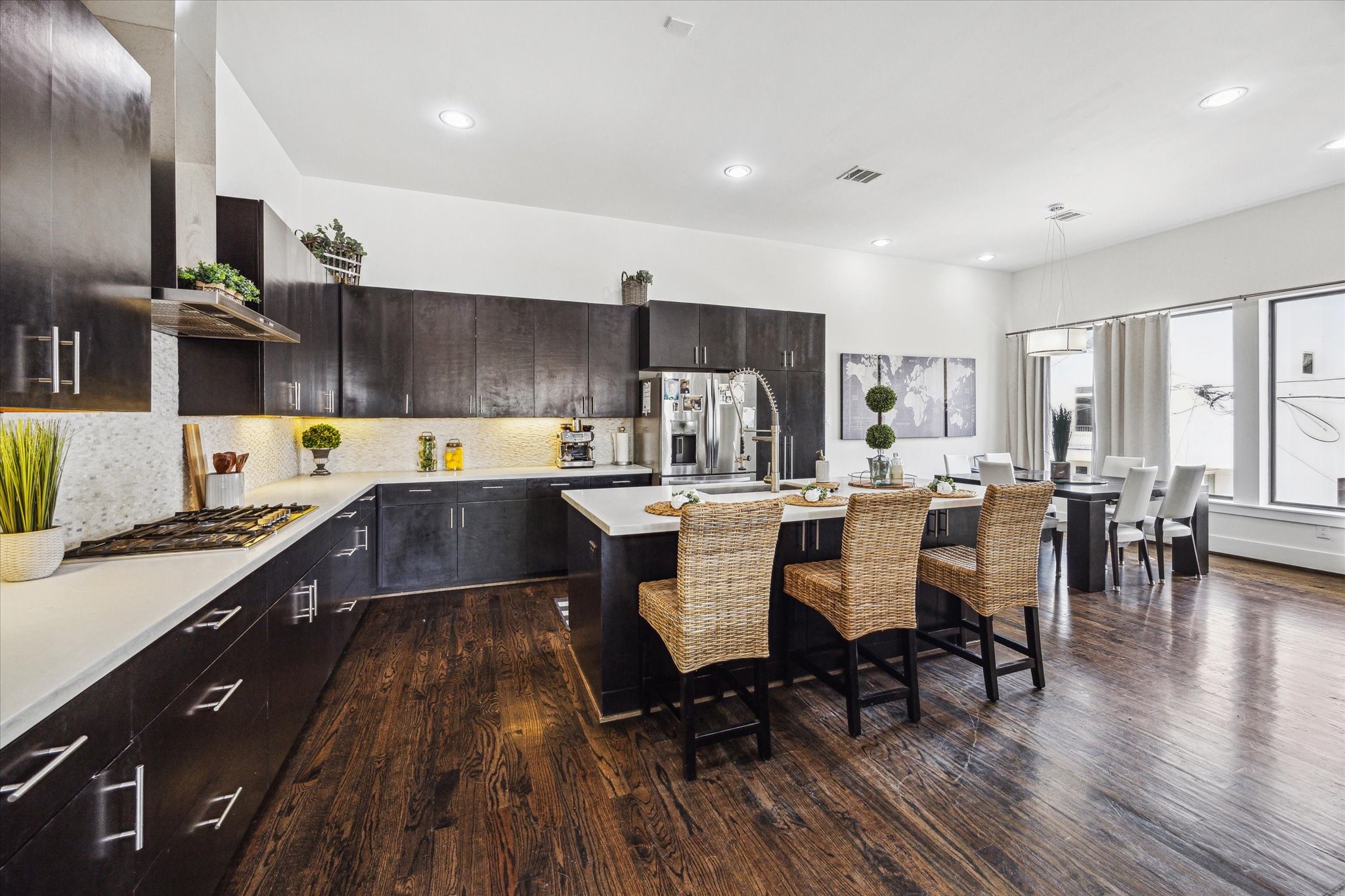 1505 Detering Street Houston, TX 77007 - Photo 11 of 27 a kitchen with a table chairs stove and cabinets