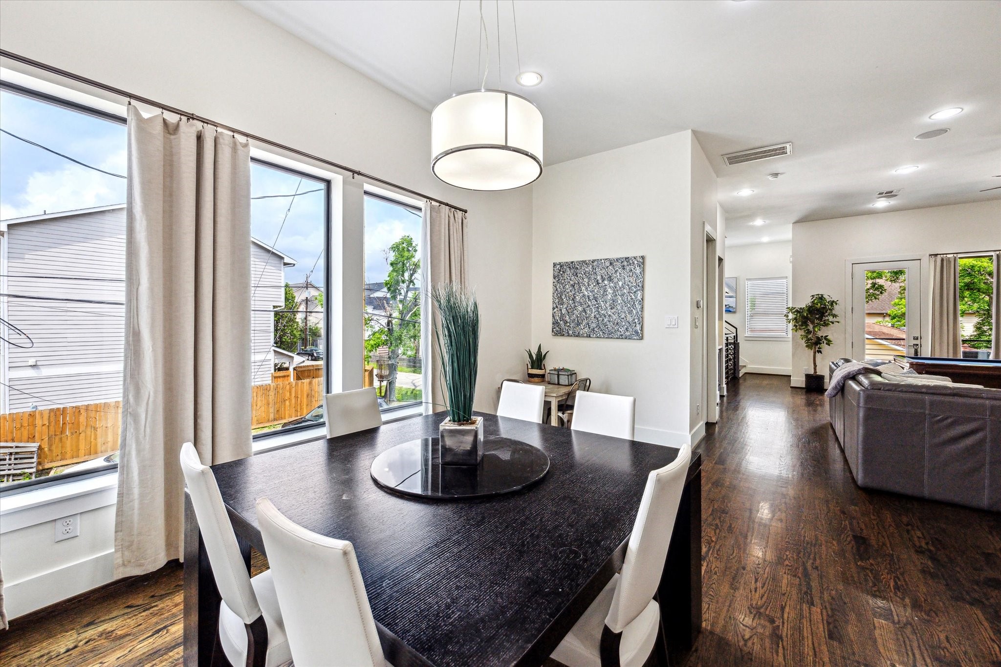 1505 Detering Street Houston, TX 77007 - Photo 12 of 27 a view of a dining room with furniture window and wooden floor