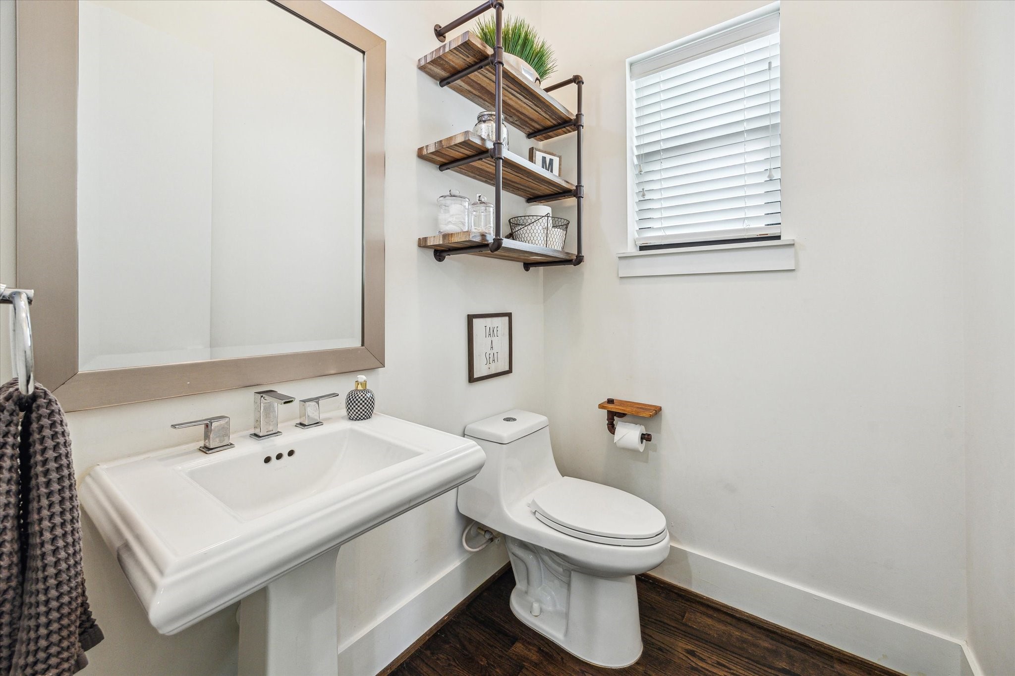 1505 Detering Street Houston, TX 77007 - Photo 17 of 27 a white toilet sitting next to a bathroom sink
