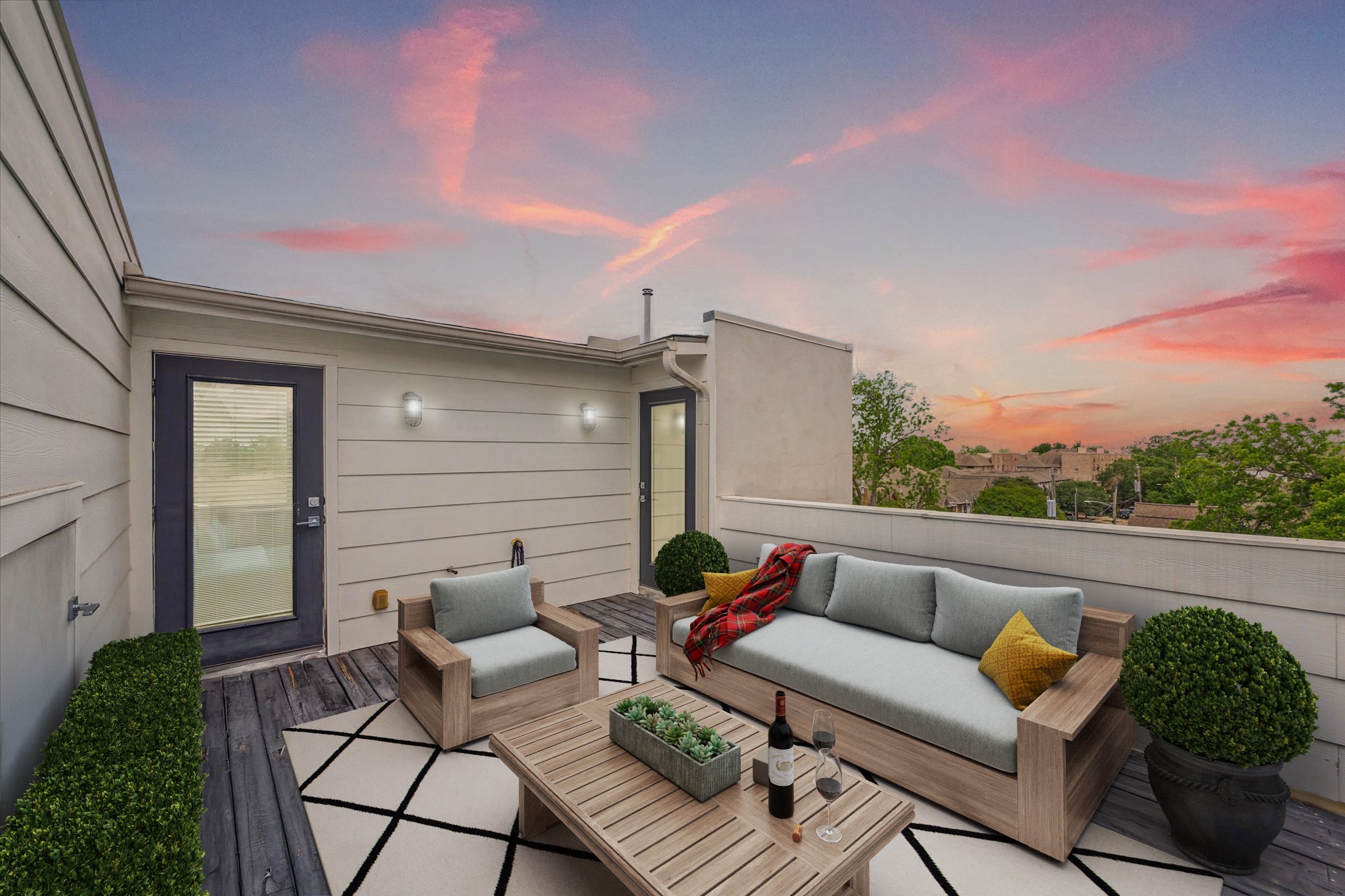 1505 Detering Street Houston, TX 77007 - Photo 23 of 27 a roof deck with couches and potted plants