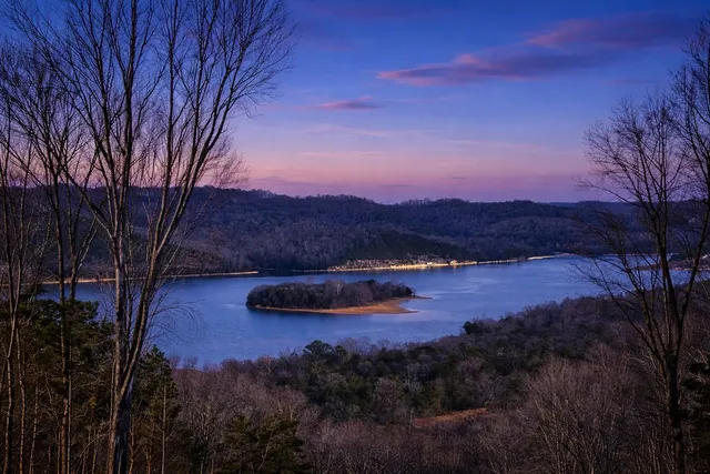 a view of lake with mountain in the back