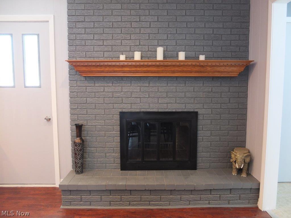 3262 Boyne Road Barberton, OH 44203 - Photo 17 of 20 Fireplace in dining room.