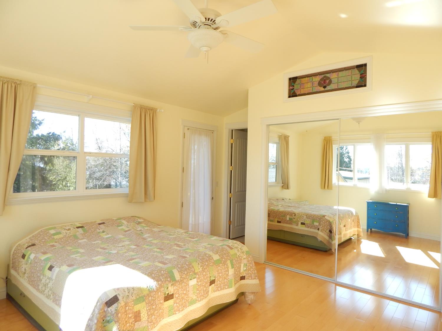 1717 Union Ridge Road Placerville, CA 95667 - Photo 17 of 55 a bed sitting in a spacious bedroom next to a window