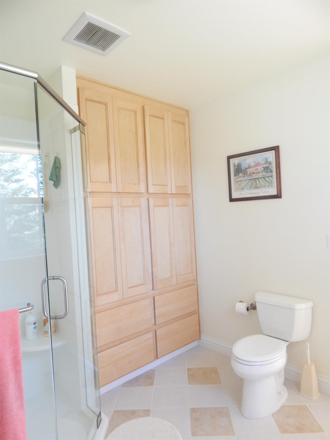 1717 Union Ridge Road Placerville, CA 95667 - Photo 21 of 55 a bathroom with a toilet a sink and shower