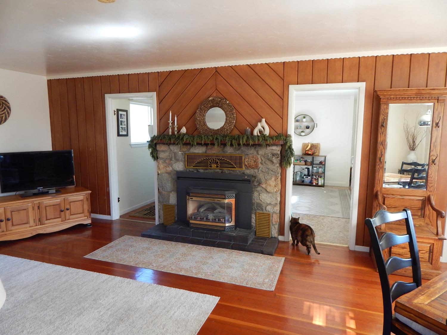 1717 Union Ridge Road Placerville, CA 95667 - Photo 36 of 55 a living room with furniture a flat screen tv and a fireplace