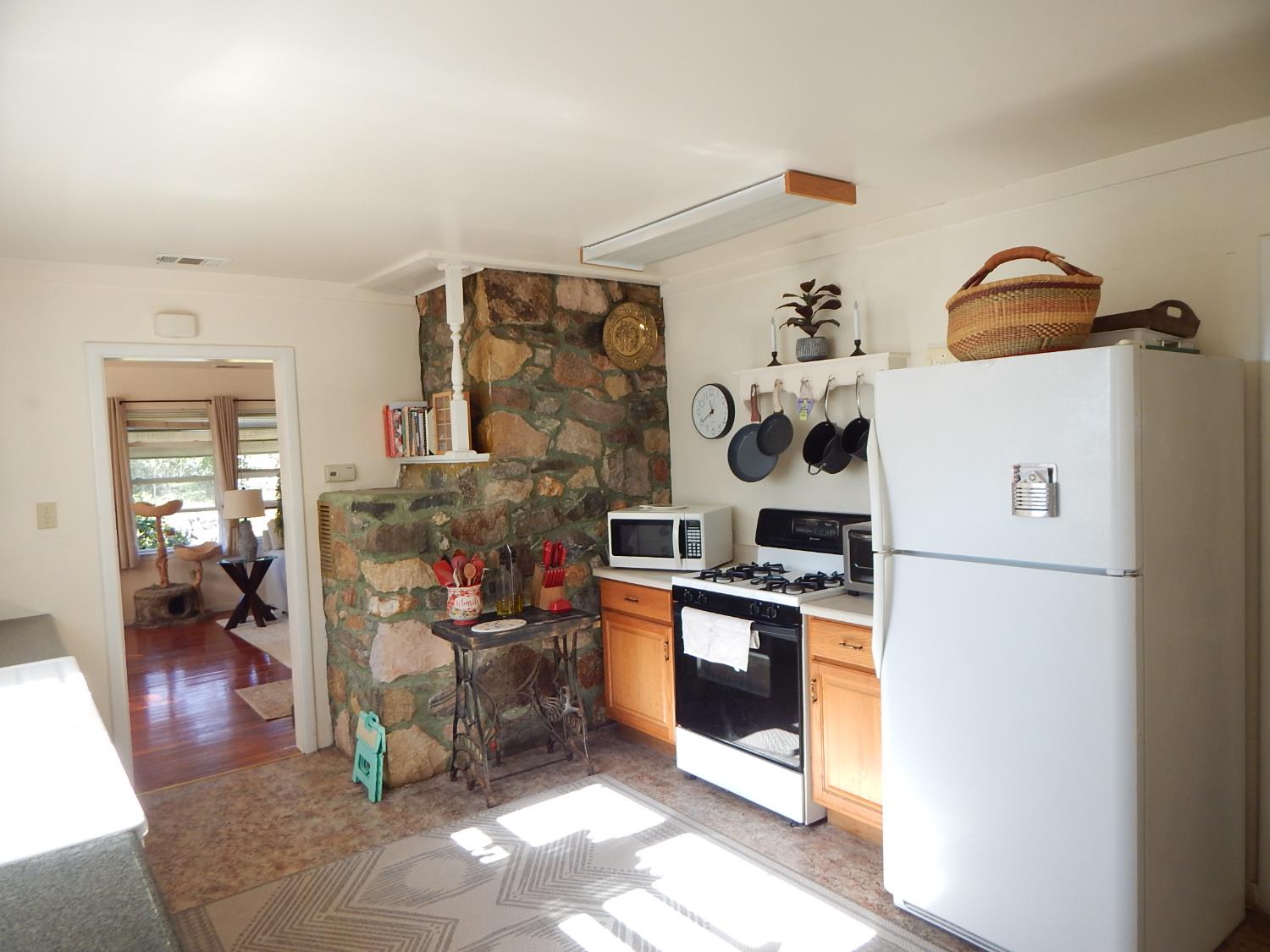 1717 Union Ridge Road Placerville, CA 95667 - Photo 41 of 55 a kitchen with stainless steel appliances granite countertop a stove and a refrigerator