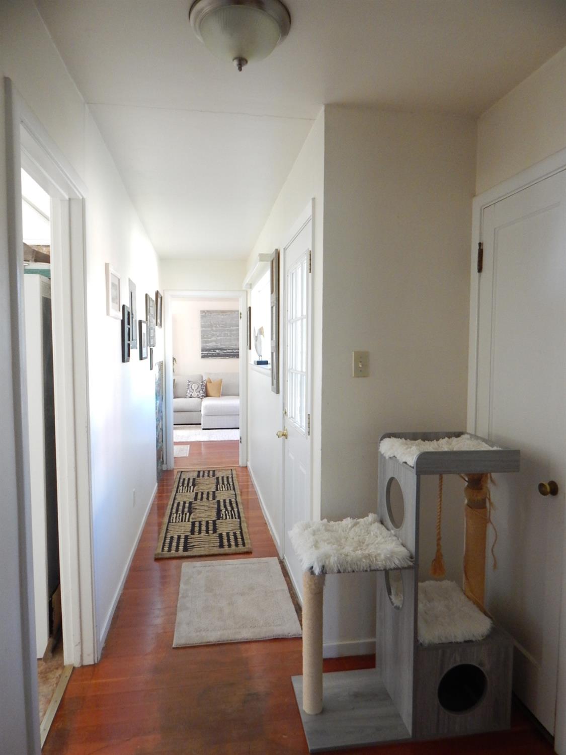 1717 Union Ridge Road Placerville, CA 95667 - Photo 49 of 55 a view of a hallway and a livingroom with furniture