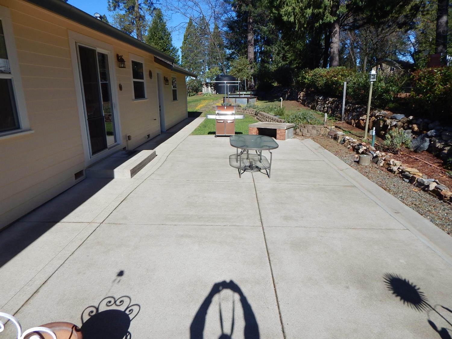 1717 Union Ridge Road Placerville, CA 95667 - Photo 5 of 55 a patio with table and chairs and potted plants
