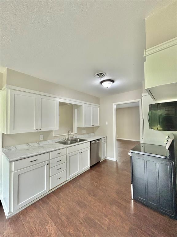 306 Line Drive Gainesville, TX 76240 - Photo 8 of 21 Kitchen View From Dining Area