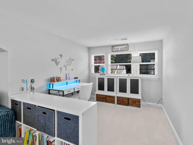 a view of a deck with table and chairs and wooden floor