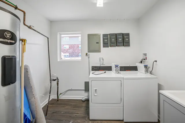 a utility room with dryer and washer