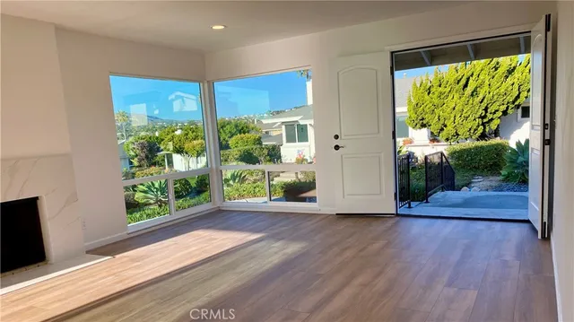 a view of a spacious bathroom with a bathtub