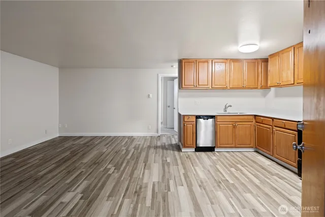 a view of backyard with outdoor seating and stairs