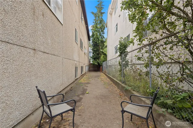 a backyard of a house with seating space