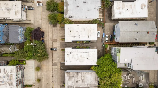 an aerial view of a city with lots of residential buildings