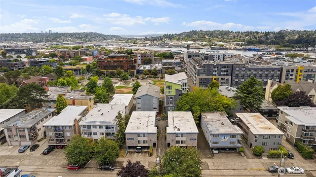 an aerial view of a city with lots of residential buildings