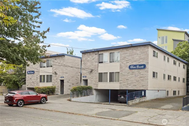 a front view of a house with parking