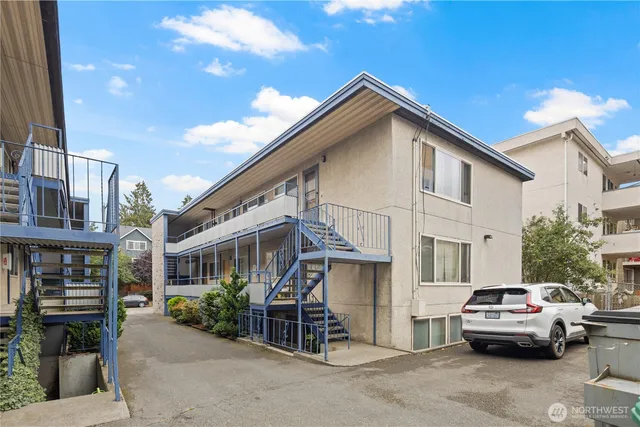 a view of a car park in front of house