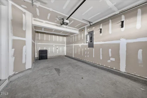 a view of a livingroom with entryway and a garage