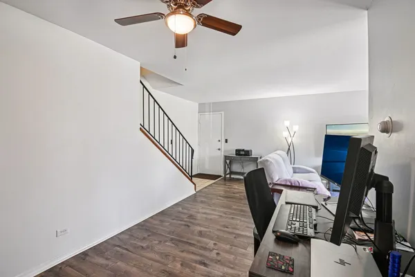 a view of a workspace with furniture and workspace