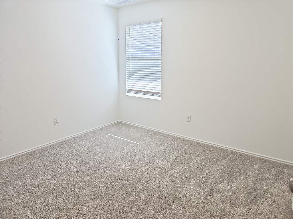 1117 Nesting Bird Drive Georgetown, TX 78628 - Photo 8 of 20 an empty room with a window