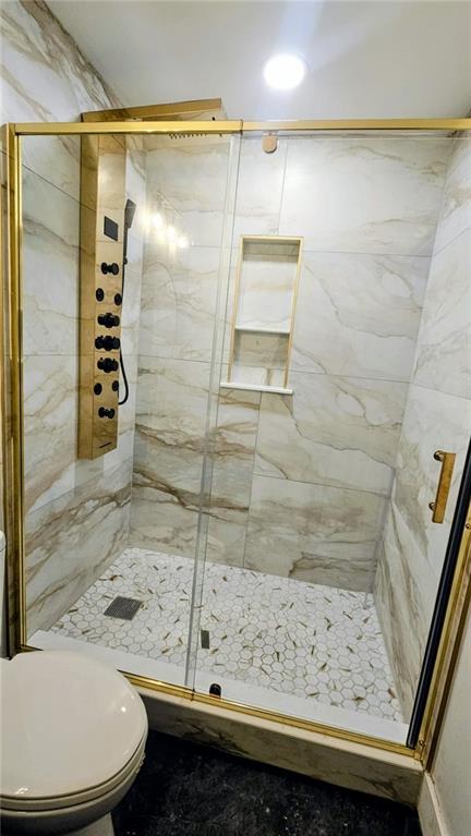 10505 Ash Rill Drive Alpharetta, GA 30022 - Photo 12 of 57 a bathroom with a shower and a sink