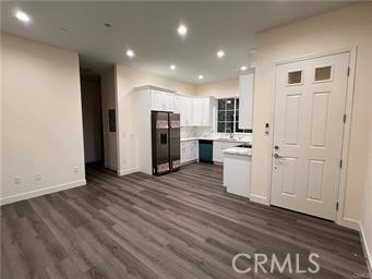 424 Concord Avenue, Unit 2 Monrovia, CA 91016 - Photo 4 of 11 a view of a kitchen with electric appliances