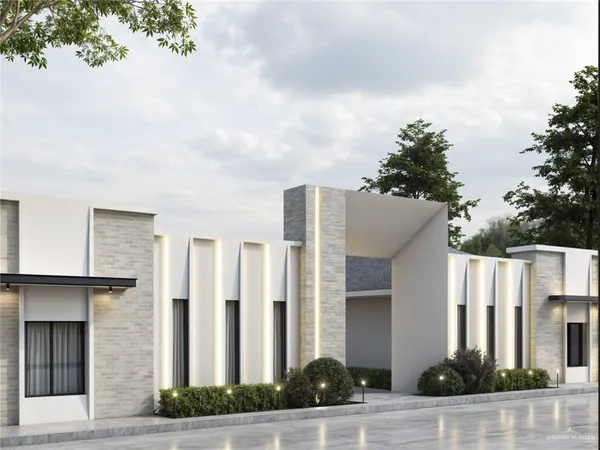 a front view of a building with garden