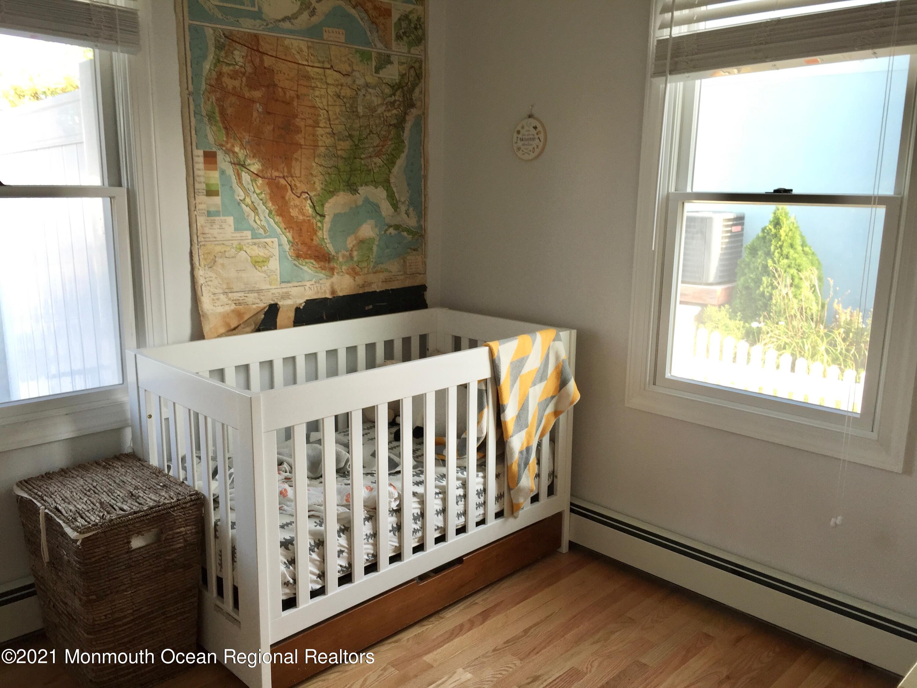124 Gary Road Toms River, NJ 08753 - Photo 14 of 18 a bedroom with a bed and a window