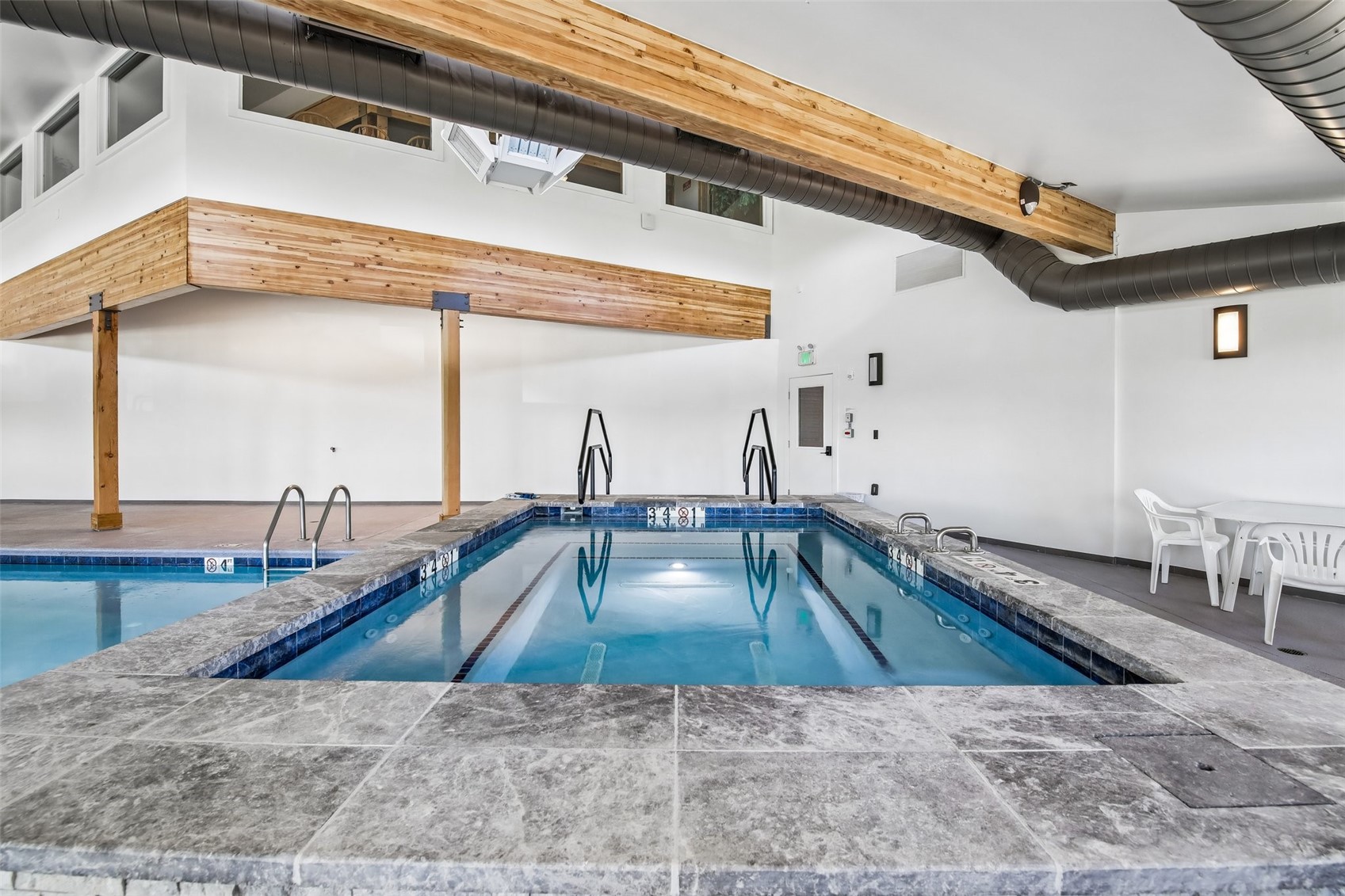 89310 Ryan Gulch Road, Unit 103 Silverthorne, CO 80498 - Photo 44 of 48 a view of a living room and bathroom