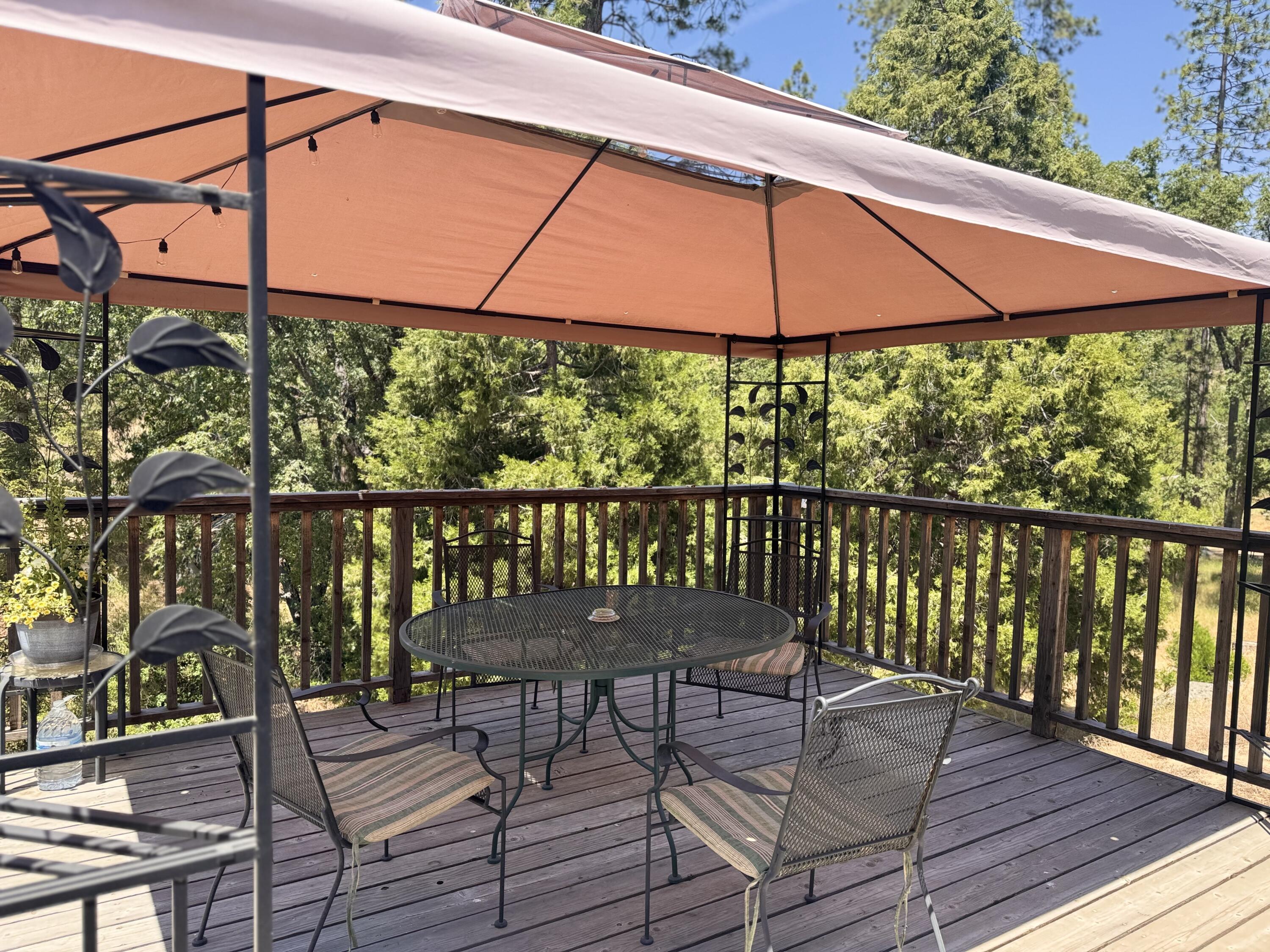 51911 Hogback Miramonte, CA 93641 - Photo 6 of 49 a view of a chairs on the roof deck