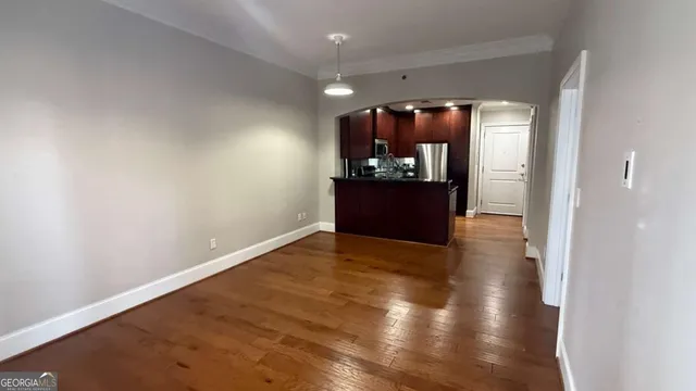 a view of entryway with kitchen