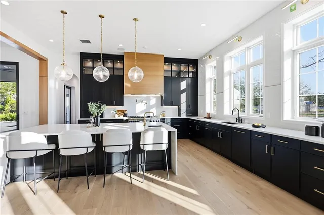 a kitchen with a stove and a cabinet