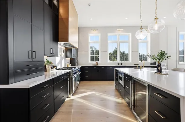 a dining room with furniture and a window