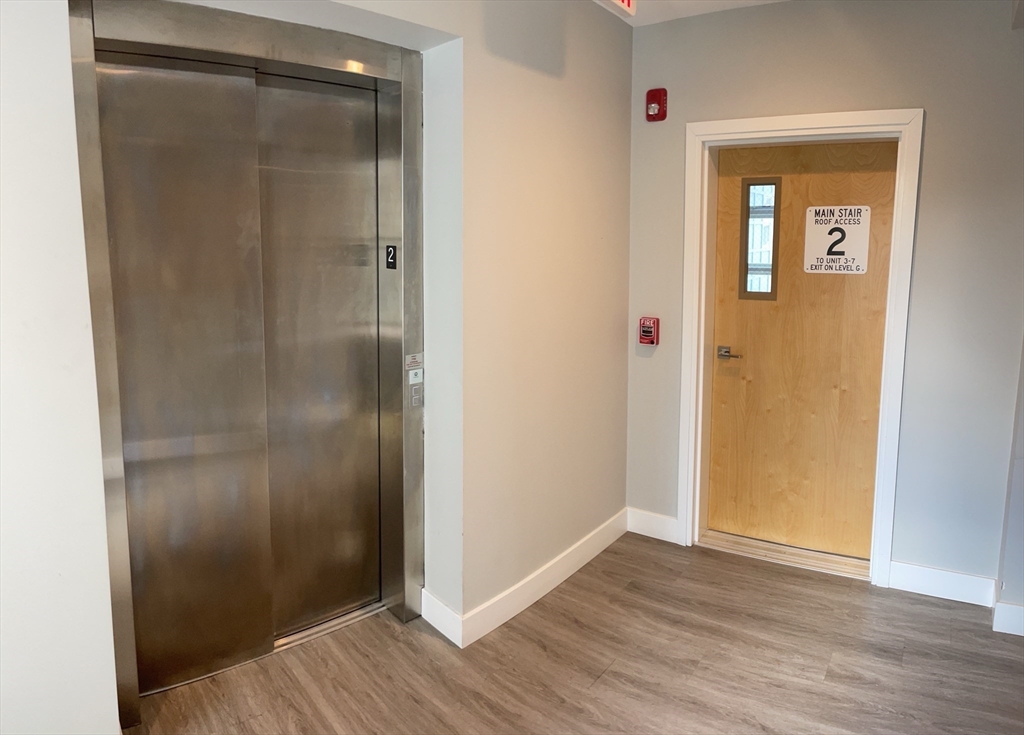 151 Hancock Street, Unit 5 Quincy, MA 02171 - Photo 9 of 12 a bathroom with a shower