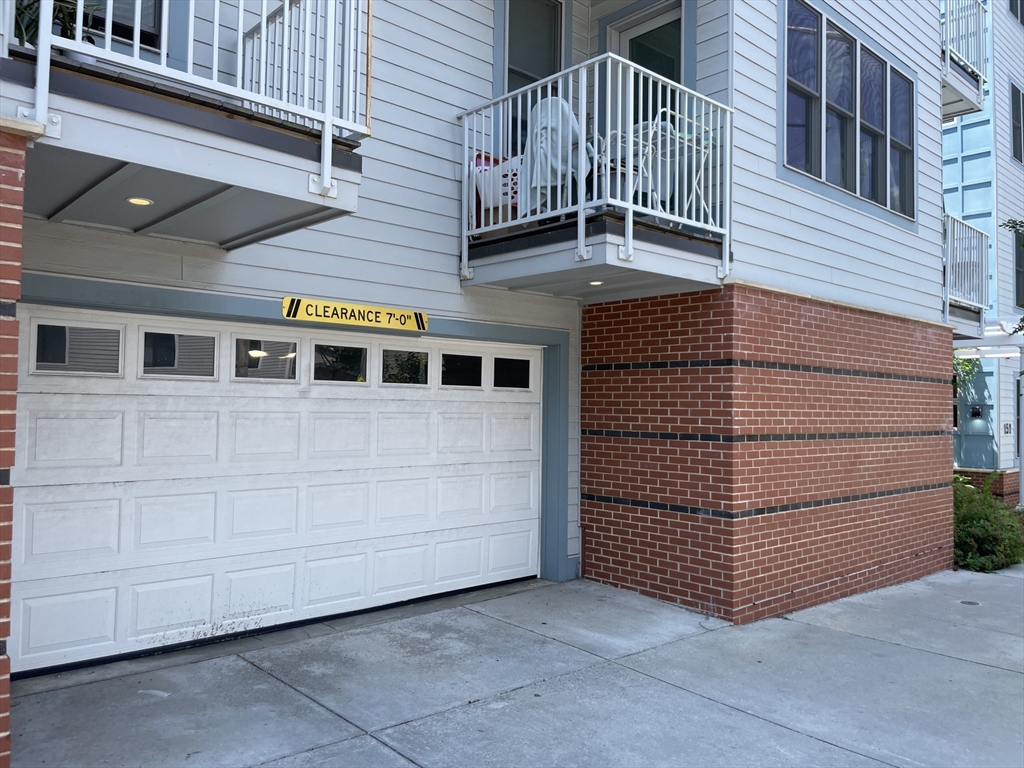 151 Hancock Street, Unit 5 Quincy, MA 02171 - Photo 10 of 12 a view of a house with a door