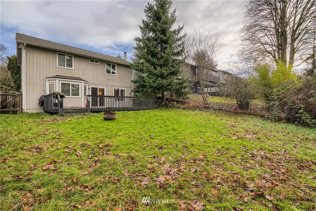 5445 17th Avenue Southwest Seattle, WA 98106 - Photo 19 of 19 a front view of house with yard and green space